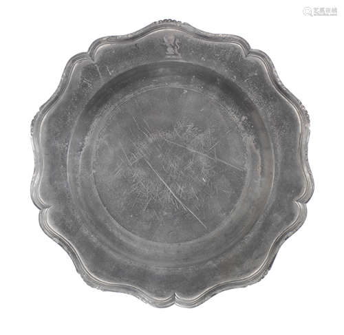 A George III pewter five lobed wavy-edged plate, circa 1770