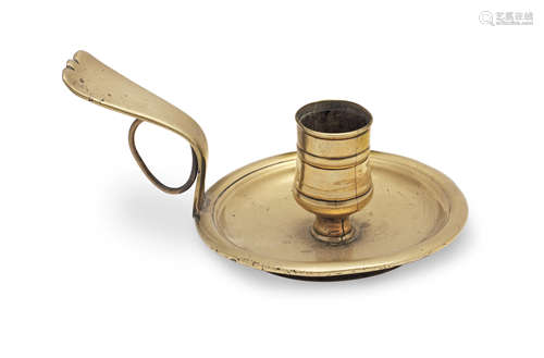 An 18th century brass chamberstick, French