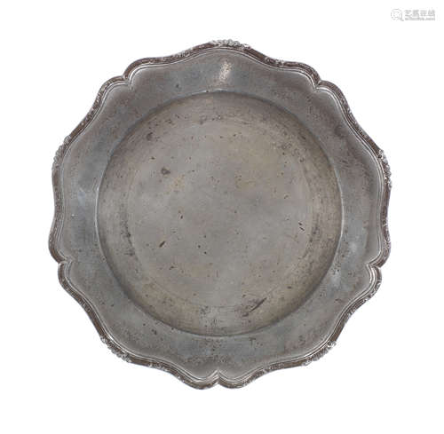 A George II pewter five lobed wavy-edge plate, circa 1755