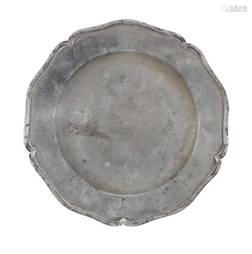 A George III pewter five lobed wavy-edged plate, circa 1800