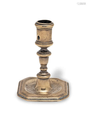 A small early 18th century brass alloy socket candlestick, p...