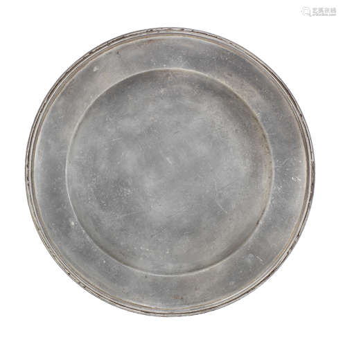 An unusual George III pewter double reeded plate, circa 1790