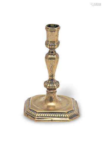 A fine and small brass socket candlestick, French, circa 174...