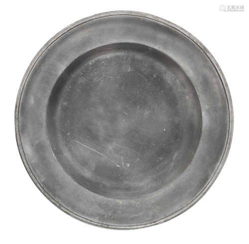 An unusual George III pewter double reeded plate, circa 1790