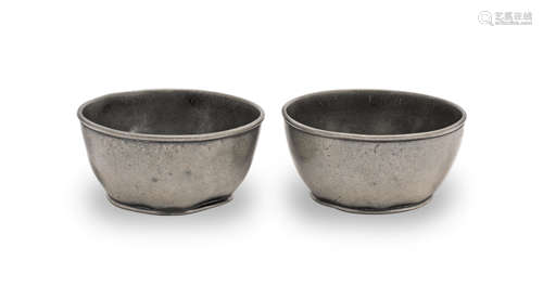 An unusual pair of Charles II pewter 'wassail bowl dippers',...