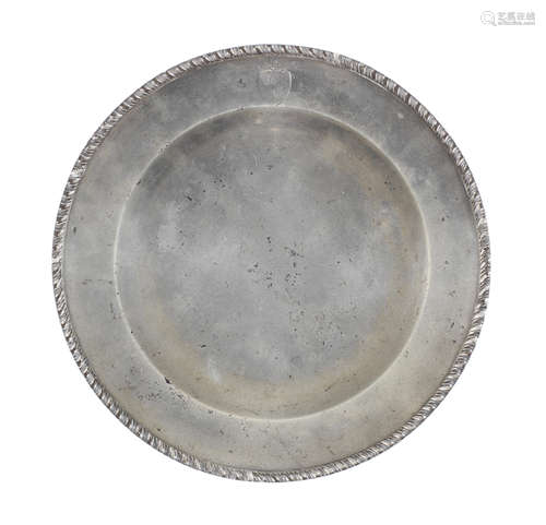 A George III pewter gadrooned-edge plate, circa 1780