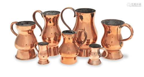 Seven 18th and 19th century copper measures