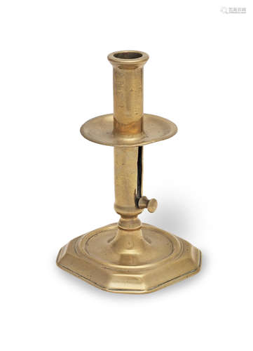 A very rare early 18th century brass socket ejector candlest...