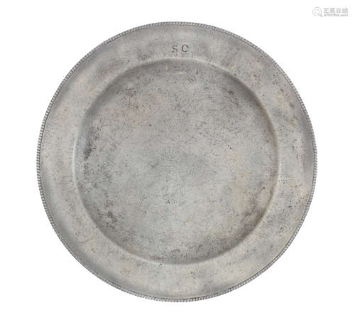 An unusual George III pewter beaded-edged plate, circa 1780