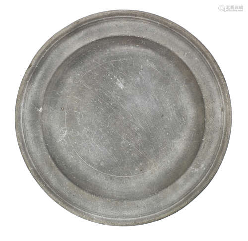 A small George III pewter single reed plate, circa 1810