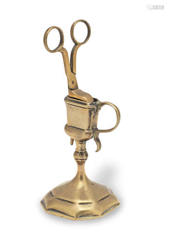 A George I brass upright snuffer stand with snuffer, circa 1...