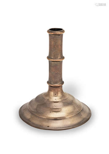 An unusual copper alloy socket candlestick, European, probab...