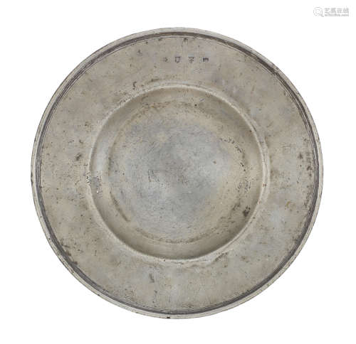 A rare and documented Charles II pewter broad rim and reeded...