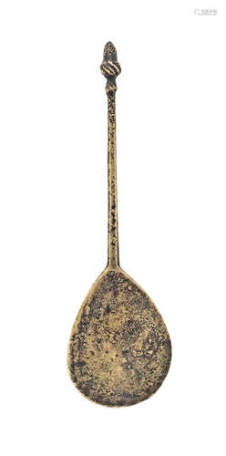 A rare latten wrythen acorn knop spoon, circa 1500