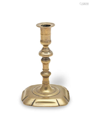 A George I brass taperstick, circa 1720