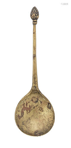 A rare latten strawberry knop spoon, circa 1640