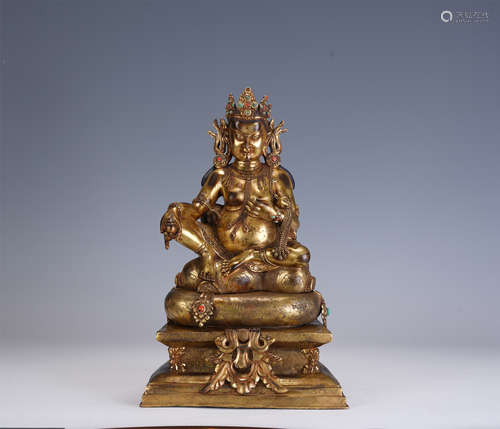 A CHINESE GILT BRONZE FIGURE OF SEATED BUDDHA STATUE