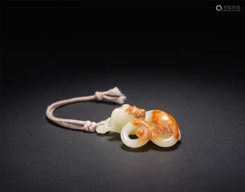 A CHINESE WHITE JADE QIAOSE PENDANT