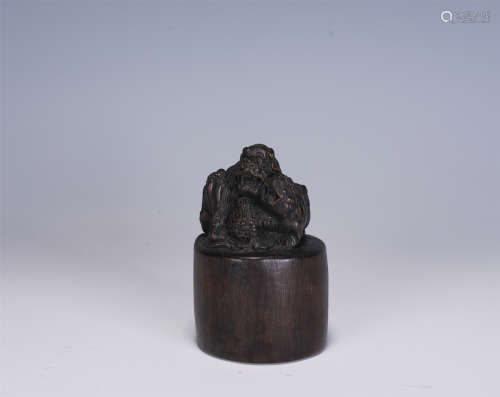 A CHINESE AGARWOOD ROUND SEAL
