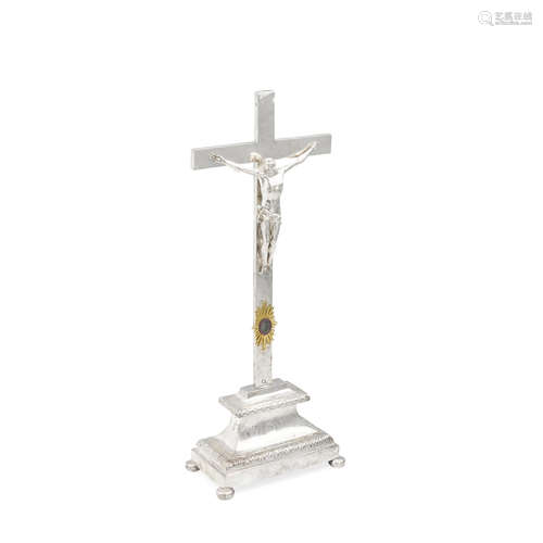 A BELGIAN SILVER CRUCIFIX ON SILVER RECTANGULAR BASE by Théo...