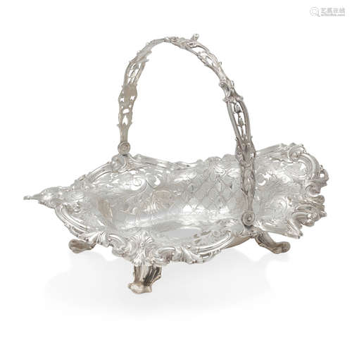 AN AMERICAN STERLING SILVER REPOUSSÉ CAKE BASKET by Frank W....