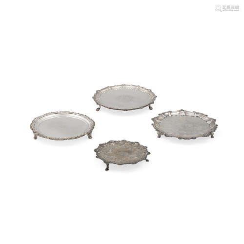 A GROUP OF FOUR GEORGIAN AND VICTORIAN SILVER SMALL FOOTED S...