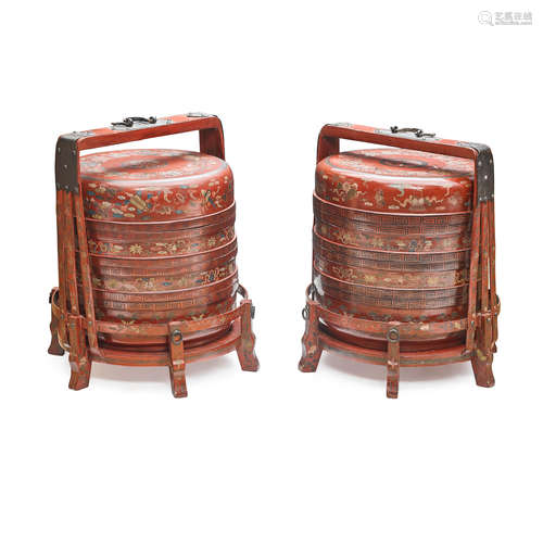 A PAIR OF CHINESE GILT DECORATED RED LACQUERED STACKING BOXE...