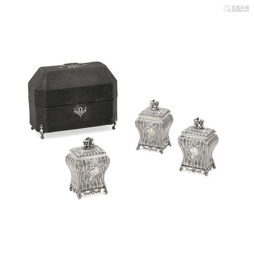 A SET OF THREE GEORGE II SILVER TEA CADDIES by William Grund...