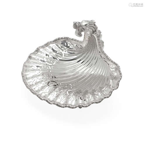 A VICTORIAN SILVER RETICULATED SHELL-FORM FOOTED DISH London...