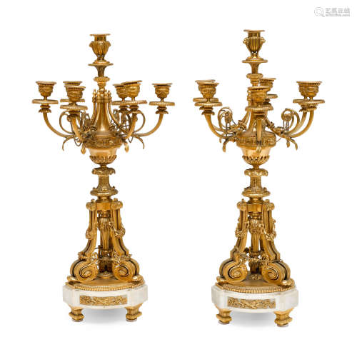 A PAIR OF LOUIS XVI STYLE GILT BRONZE AND MARBLE SEVEN-LIGHT...