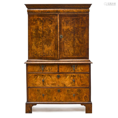 A GEORGE I BURL WALNUT AND MAHOGANY CABINET ON CHEST Early 1...