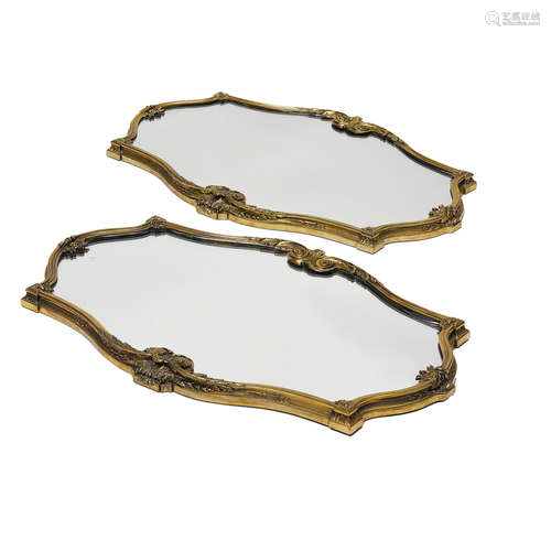 A PAIR OF ROCOCO STYLE GILT BRONZE MIRRORED PLATEAUS