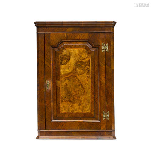 A GEORGE I/II WALNUT HANGING CORNER CUPBOARD 18th century