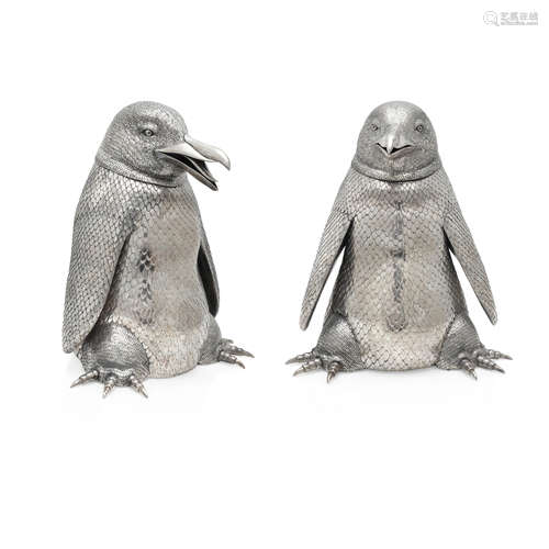 A PAIR OF ITALIAN STERLING SILVER PENGUIN-FORM WINE COOLERS ...