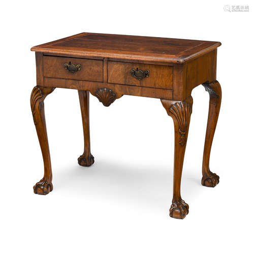 A GEORGE II CARVED MAHOGANY TWO DRAWER SIDE TABLE Mid-18th c...