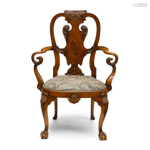 A GEORGE II STYLE CARVED WALNUT ARMCHAIR Late 19th century