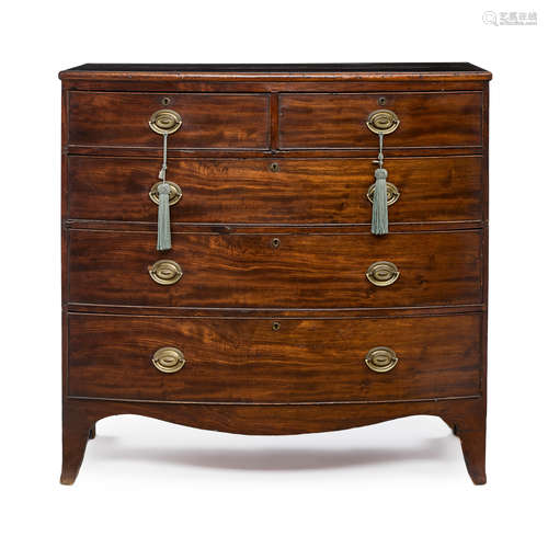 A GEORGE III MAHOGANY BOWFRONT CHEST OF DRAWERS Early 19th c...