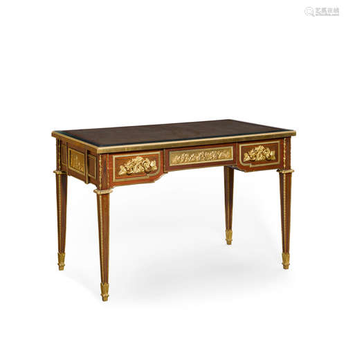 A LOUIS XVI STYLE GILT BRONZE AND PARQUETRY BUREAU PLAT Earl...