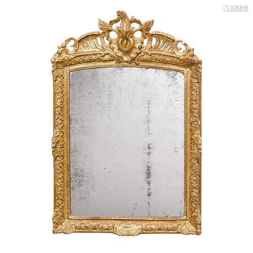 A CONTINENTAL ROCOCO STYLE GILTWOOD MIRROR 18th century