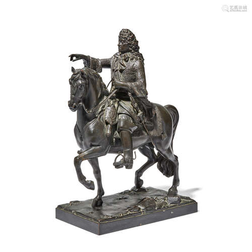 A FRENCH PATINATED BRONZE GROUP OF LOUIS XIV ON HORSEBACK Af...