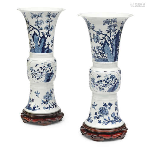 A PAIR OF CHINESE BLUE AND WHITE PORCELAIN GU FORM VASES 20t...