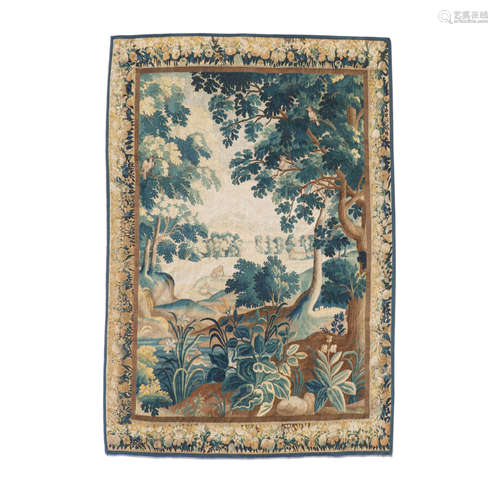 A FLEMISH WOVEN WOOL VERDURE TAPESTRY Late 17th Century