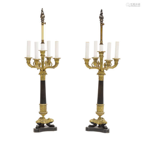 A PAIR OF CHARLES X STYLE GILT AND PATINATED MARBLE FIVE-LIG...