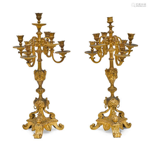 A PAIR OF BAROQUE STYLE GILT BRONZE SEVEN-LIGHT CANDELABRA E...