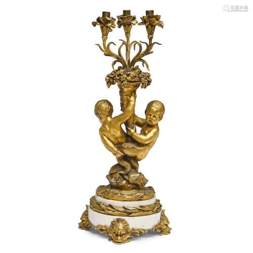 A LOUIS XV STYLE GILT BRONZE AND MARBLE THREE-LIGHT FIGURAL ...