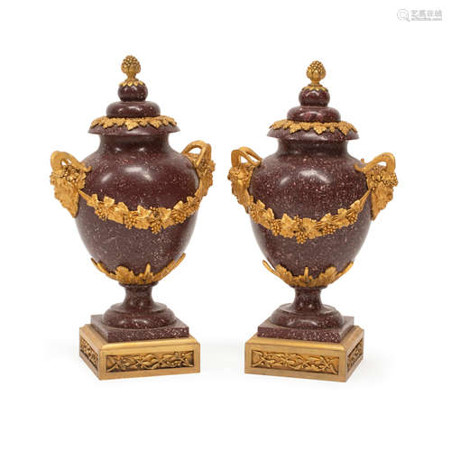 A PAIR OF LOUIS XVI STYLE GILT BRONZE MOUNTED PORPHORY COVER...