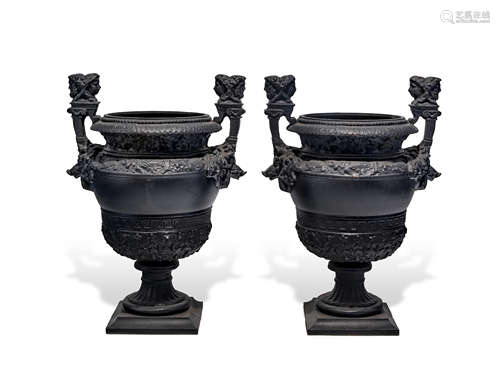 A PAIR OF LOUIS XIV STYLE PAINTED CAST-IRON VASES by Christo...