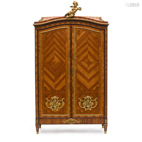 A LOUIS XVI STYLE GILT BRONZE MOUNTED TULIPWOOD ARMOIRE Edmo...