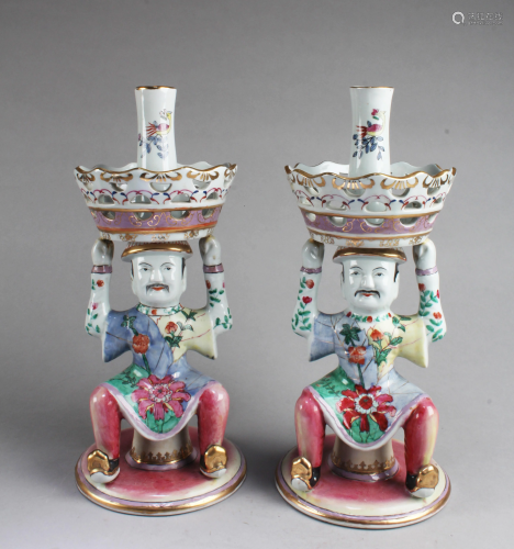 A Pair of Porcelain Candle Holders