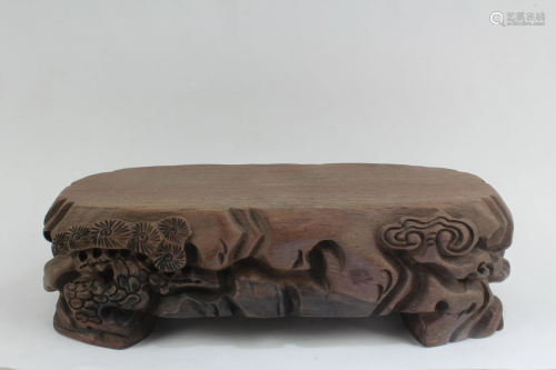 A Carved Wooden Base